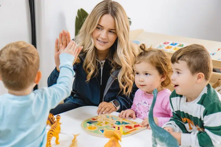 early educator and children playing at bright steps academy centre